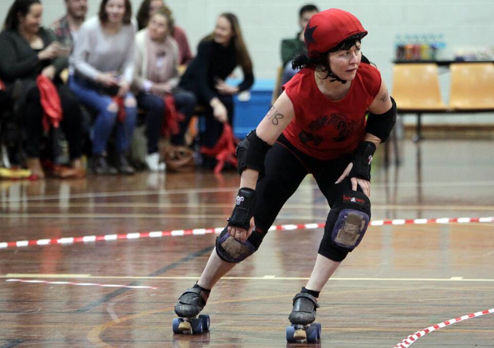 LONE RANGER: Murderous Crows player Shae Frasco cruises around the track in the roller derby bout at Bolton Park on Saturday. Picture: Les Smith