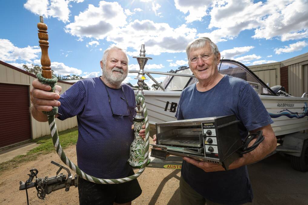 Grab yourself a bargain ... Neighbours Barry Dixon and John Waters can't wait for the highly anticipated 25th annual Jindera Community Garage Sale on Sunday, April 14. Picture by James Wiltshire