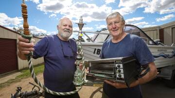 Grab yourself a bargain ... Neighbours Barry Dixon and John Waters can't wait for the highly anticipated 25th annual Jindera Community Garage Sale on Sunday, April 14. Picture by James Wiltshire