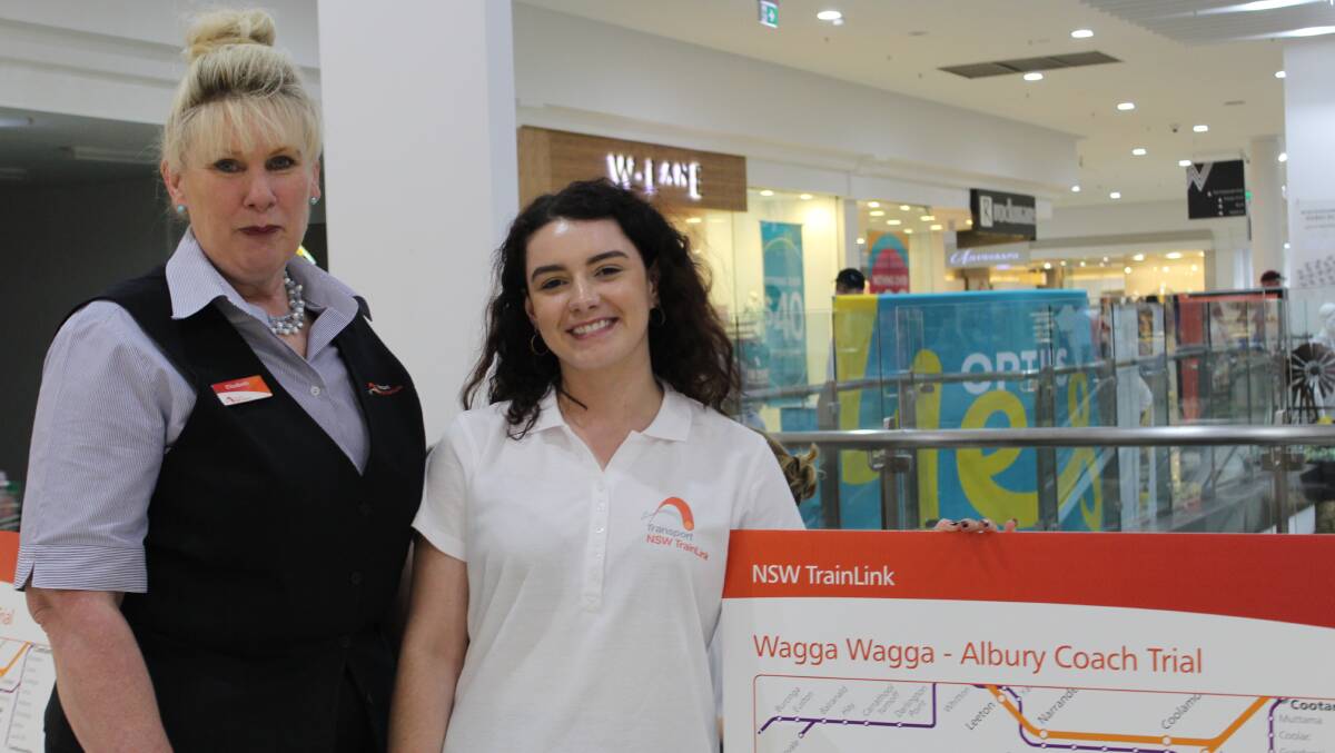 On the tracks: TrainLink senior customer service attendant Elizabeth Dinnell and research executive Alexis Polidoras met with Wagga residents to discuss a bus service from Wagga to Albury. 