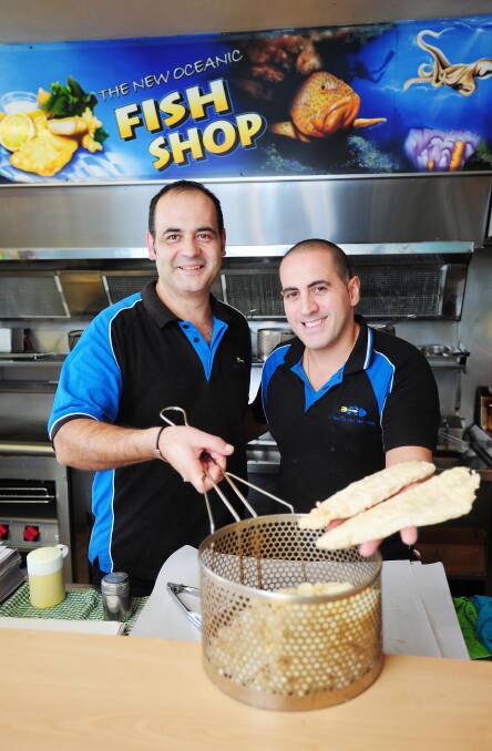 Sea of support: Wagga's New Oceanic Fish Shop, co-owned by Kosta Papaioanou and John Spanos, could be named the best in Australia. Picture: Kieren L Tilly 