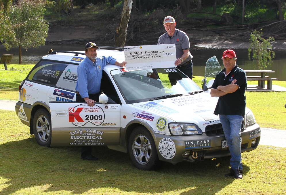 Rallying for a cause: Kidney Kar Rally team XPLANT, John Clout, Kerry Flinn and Brian Roy , have received a donation of more than $9000, following a Celebrity Sportsmen’s Night. Picture: Les Smith
