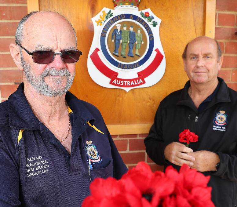 Fundraising fall: Wagga RSL sub branch secretary Ken May and treasurer Brian Watts say there will not be enough Poppies to pass around this Remembrance Day. Picture: Kieren L Tilly 