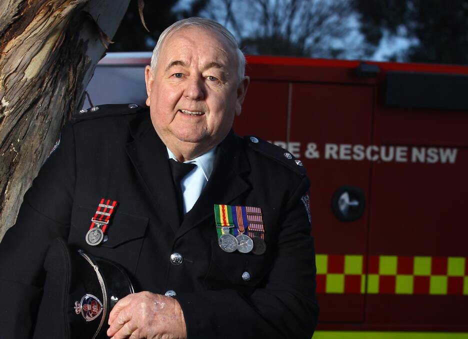Dedication and service: Former Fire and Rescue NSW captain Robert Duncan was recognised for 45 years of service at a special ceremony in Junee.