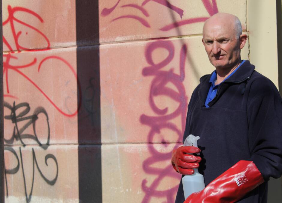 One man's war: William Hort spends hours cleaning graffiti from Wagga's walls and MP Daryl Maguire says residents with community service orders should join him. 