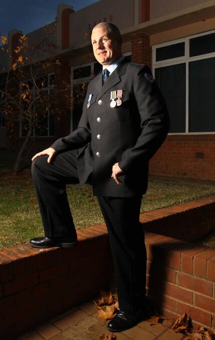 Climb for a cause: Retained firefighter and Wagga police inspector Rob Vergano will climb to great heights for MND, a cause close to his heart. Picture: Les Smith