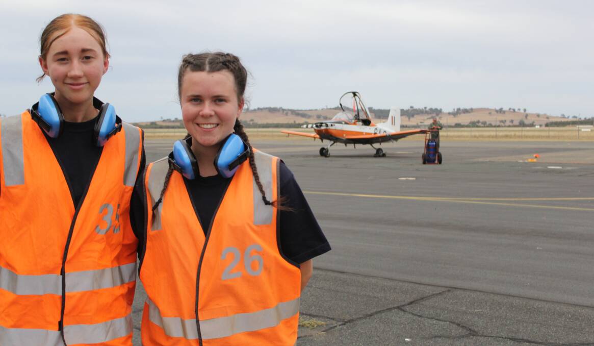 Highway to the future: Kooringal High School student Samantha Ritchie and Cootamundra year-12 student Claire Sellars had a taste of their dream careers at RAAF Base Wagga this week. 