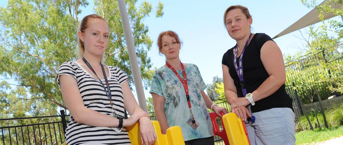 Furious: Riverina Children’s Centre staff Elise Harris, Christine McCaron and Monica Graham speak up.