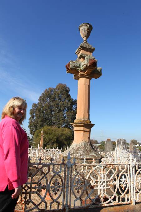 Mystery: Council volunteer Liz Westcombe has been documenting the graves in Wagga for more than a decade but the riddle of one resting place has her stumped. 