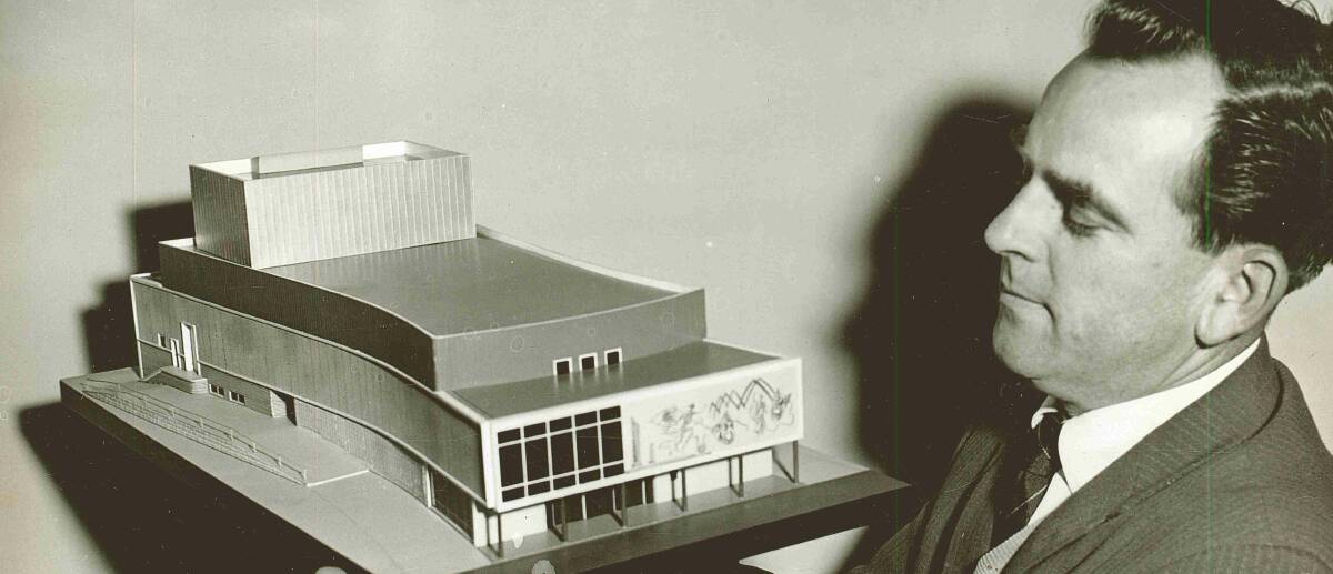 PLANS: Town clerk Bill Ellis inspects the architectural model of the Wagga Civic Theatre. Picture: CSU Regional Archives