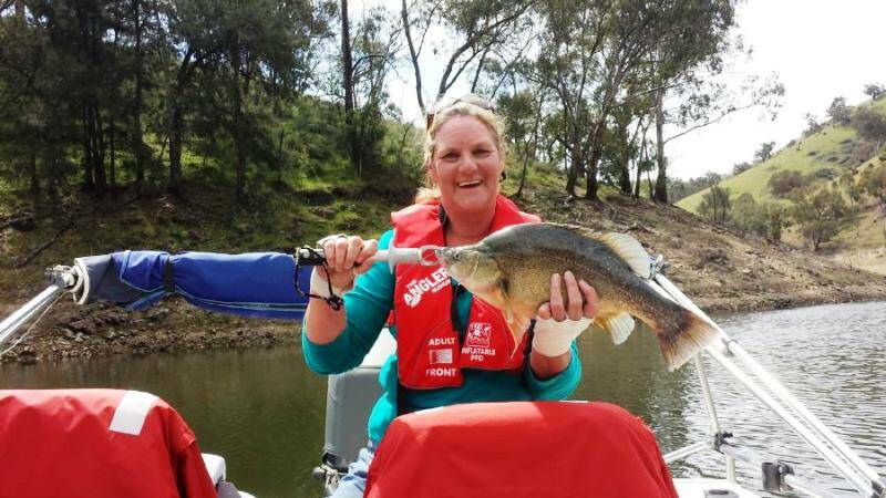 NICE CATCH: Jaynie Charlton with a yella from Burrinjuck. Picture: Contributed