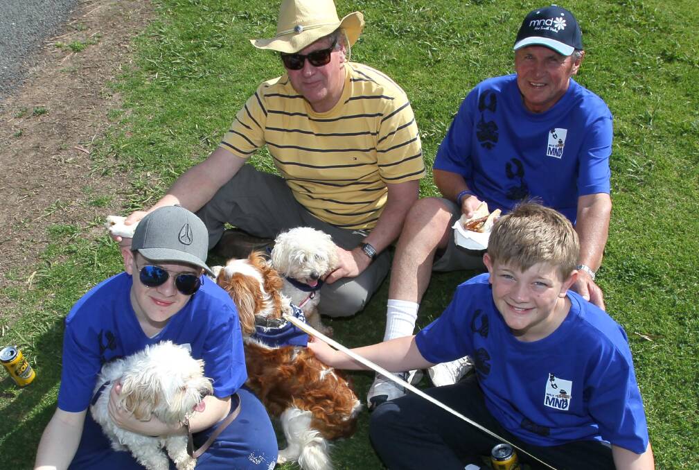 SPRING TIME: Wagga residents Ryan De Paoli, Alan Bowyer, Greg Bowyer and Clay De Paoli, with dogs Safi, Gus and Charlie recently. Picture: Les Smith