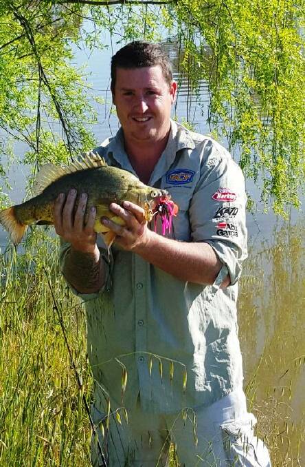 GOOD DAY: Mathew Storm with a yella from the Murrumbidgee River: Picture: Contributed