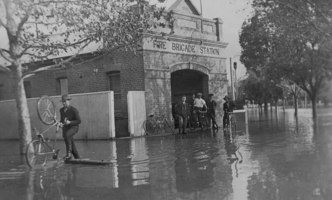 WET TIMES: The Wagga Fire Brigade in Morrow Street during the 1925 flood. The station moved from Morrow Street to its premises in the Esplanade in January 1927.
Morrow Street was leased to the Returned Sailors and Soldiers Imperial League of Australia (RSSILA) in 1930. The building is presently occupied by Sunflower House.