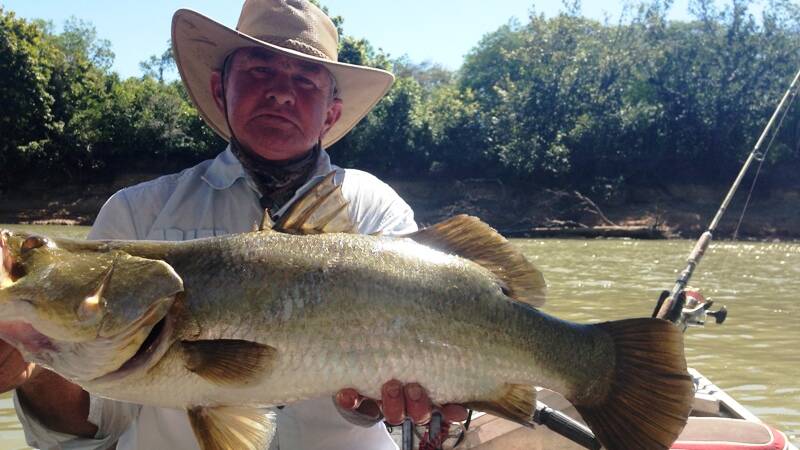 PROUD: John Argus with a nice barramundi from the Daly River. Picture: Contributed