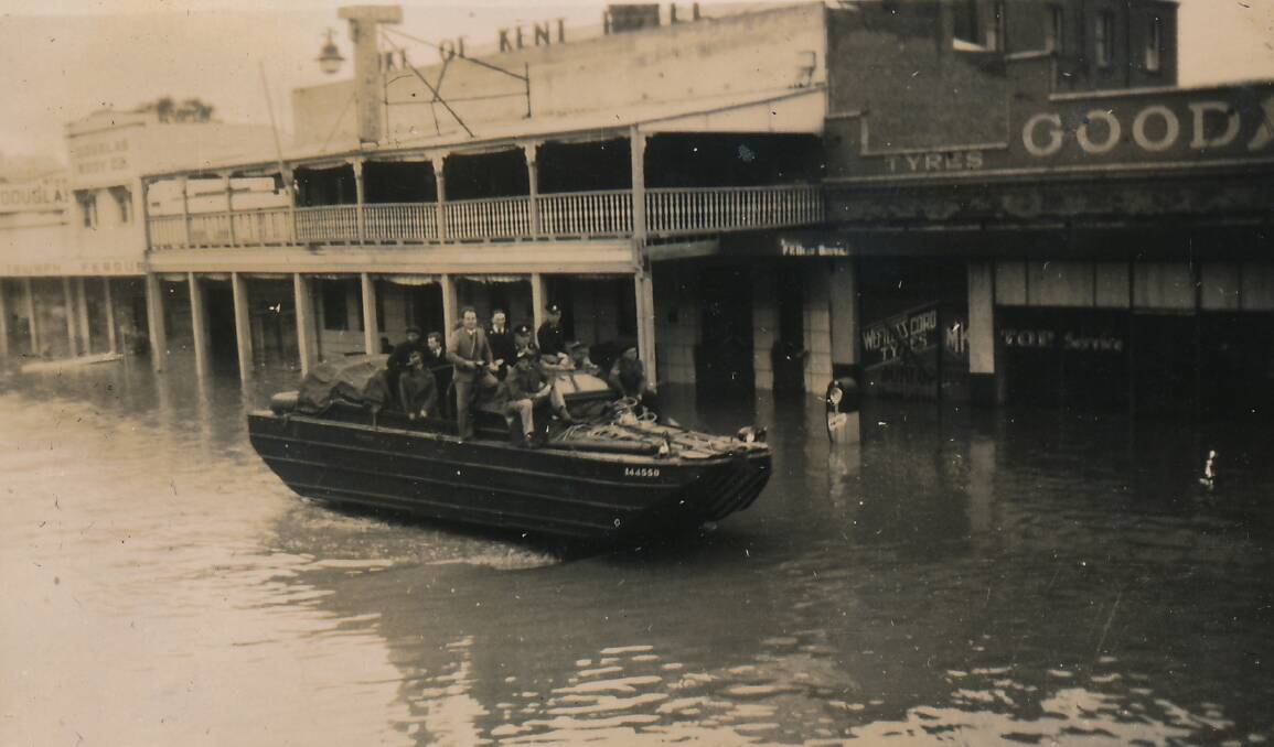ROW, ROW, ROW, YOUR BOAT An amphibious Army DUK outside the Duke of Kent Hotel in Fitzmaurice Street during the flood of June 1952. Picture: Sherry Morris Collection
