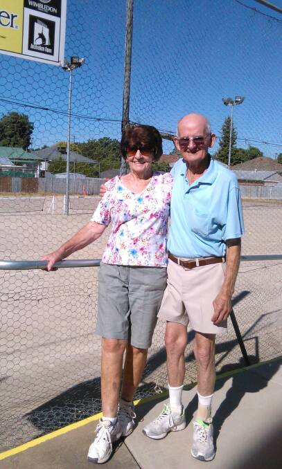 YOUNG AT HEART: Nev Taber celebrated his 90th birthday recently with a hit of tennis and still plays regularly every week. He is pictured at the courts before another match with Marie Martin. Picture: Contributed