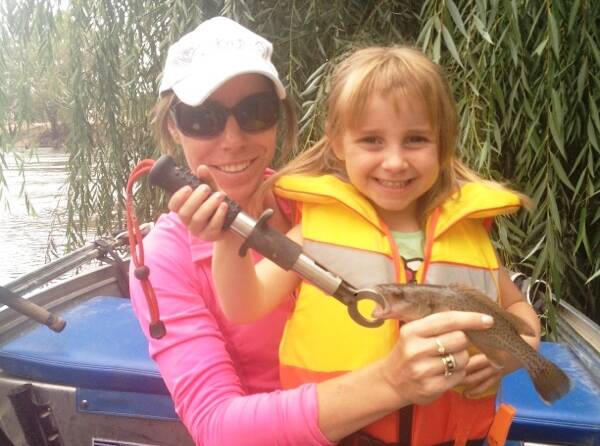GIRL POWER: Alexis and Felicity Ayton with a trout cod from the Murrumbidgee. Picture: Contributed