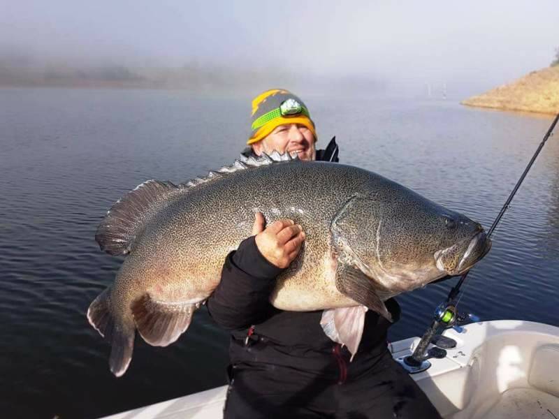 BIG ENOUGH?: A couple of brave fishermen fought the Burrinjuck cold to snare this massive cod. Send you pictures to – craig@waggamarine.com.au or 0419 493 313.