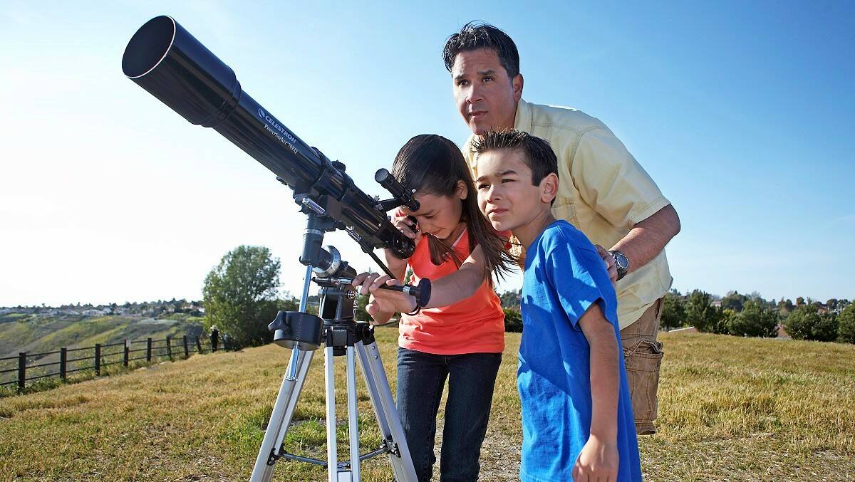 FAMILY: A telescope is a family affair, especially for the kids who love to sky-gaze. Picture: Celestron