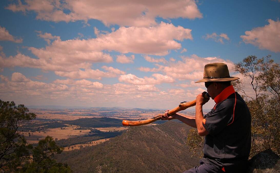 EDUCATION: Mark Saddler plays a Brolga didgeridoo at Kengal (The Rock). Mark believes more education is needed, both for non-Indigenous and Indigenous people, to preserve our nation's first culture. Picture: Mark Saddler