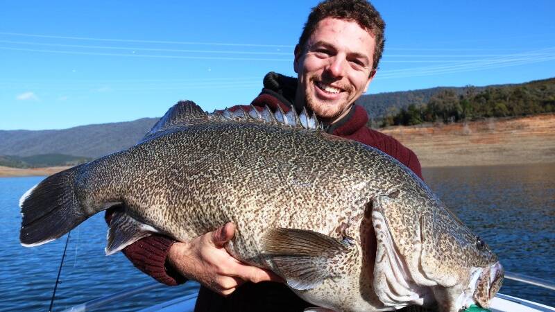 HAPPY: Jack Zyhalak with a cod from Blowering. Picture: Contributed