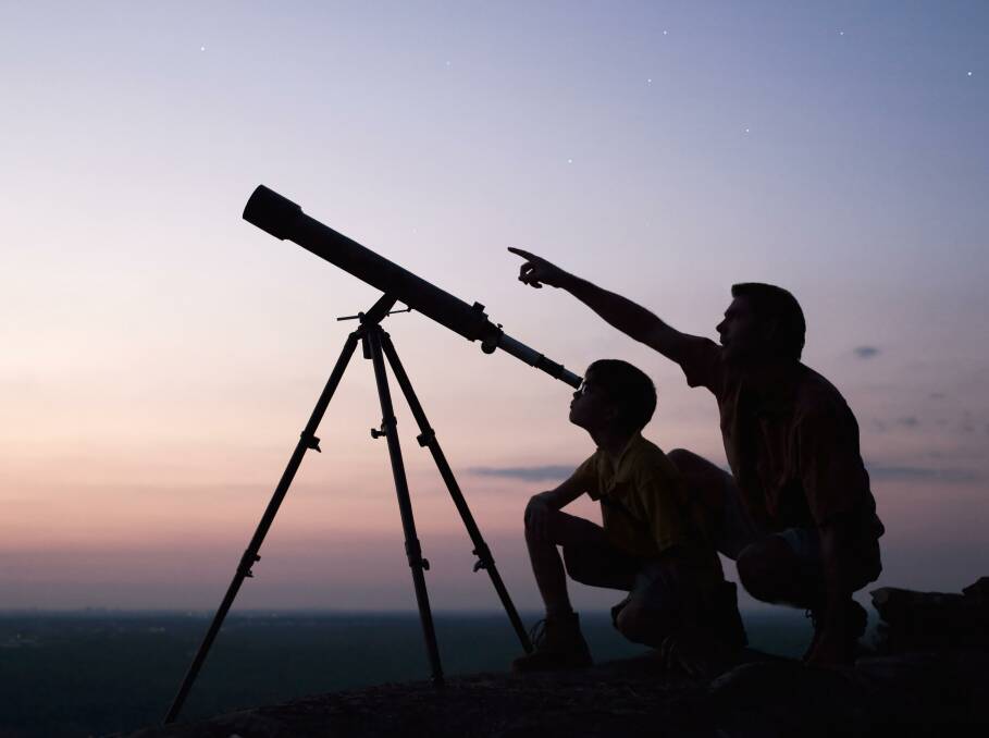 LOOK UP: Even a small telescope will open up a world of wonders in the summer night sky. Picture: Contributed
