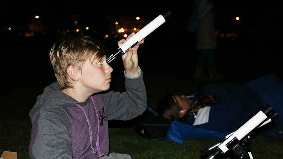 SKY WATCH: Even a small telescope will open up a world of wonders in the summer night sky. Picture: ANU