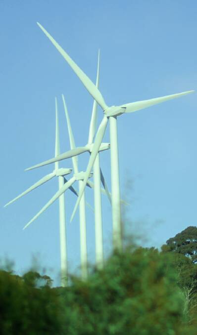 IN ACTION: Wind turbines at Cullarin on an 85 per cent day. Picture: Keith Wheeler