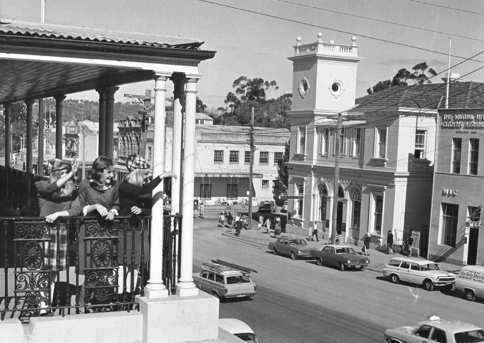 SKY HIGH: This photo from the Tom Lennon collection, taken in the 1960s shows the verandah of the then Post Office with the ANZ Bank, Fosseys and MLC buildings in the background. Picture: CSURA RW1574