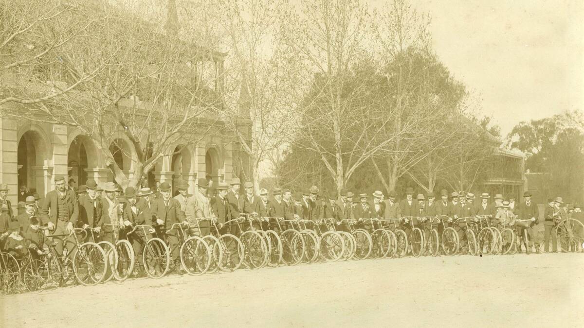 TWO WHEELS: Cycle racing was very popular in the late 1800s. This photo, taken in 1895 outside the Post Office shows cyclists ready to participate in one of the regular race days. Picture: CSURA RW5