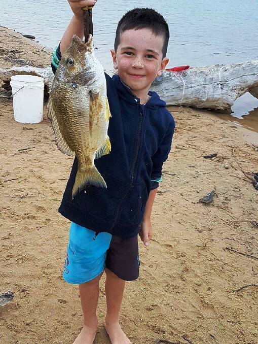 PROUD AS PUNCH: Lucas Healy with a 38cm bream from Tathra. Send your pictures to craig@waggamarine.com.au or 0419 493 313.