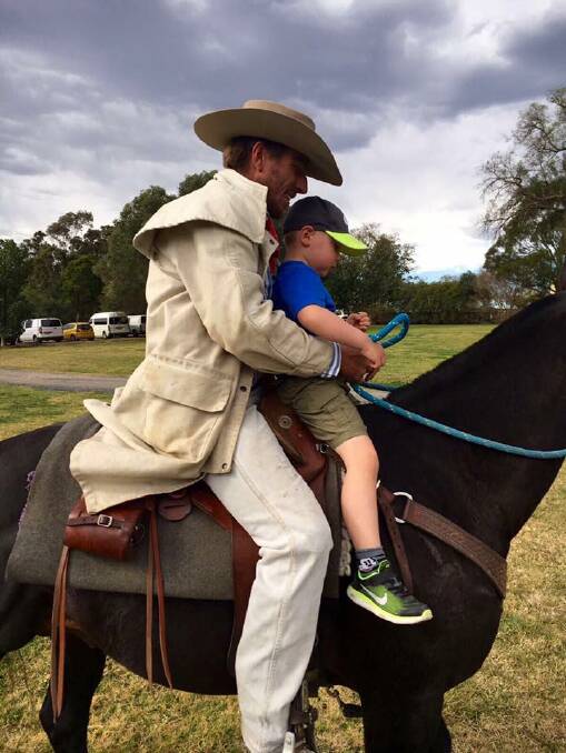 HORSEMAN: Lucas Dowell was a capable horseman and worked as a horse farrier, shown here with his much-loved nephew. 