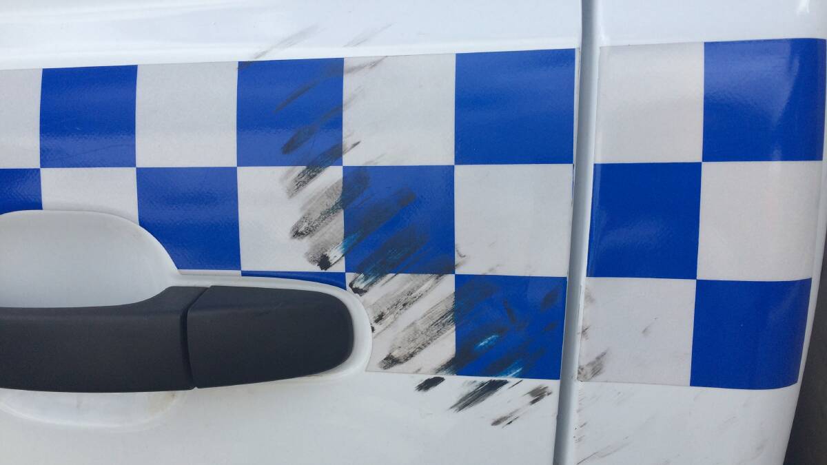 BIKE VS POLICE CAR: Marks left on a police vehicle after it was hit with a pushbike
Picture: Marguerite McKinnon