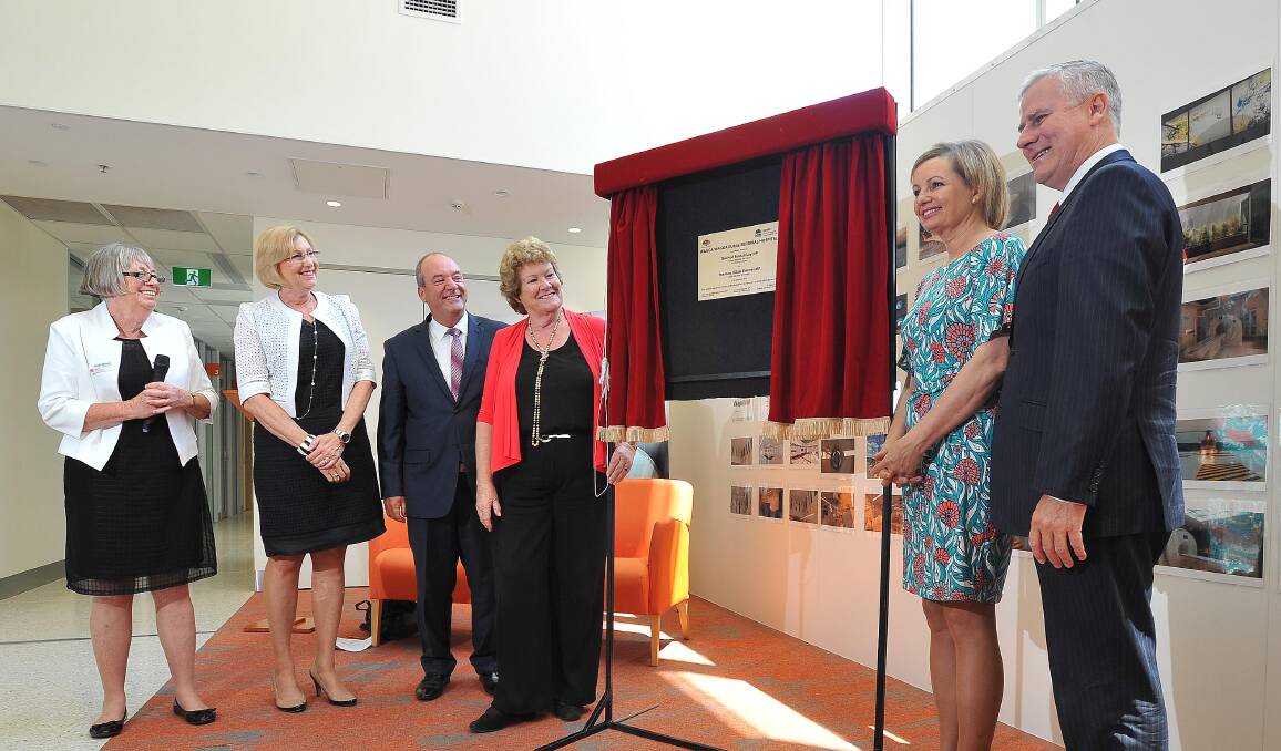 MILESTONE: Gayle Murphy, Jill Ludford, Daryl Maguire, Jillian Skinner, Sussan Ley and Michael McCormack unveil the new hospital's plaque, confirming its completion.