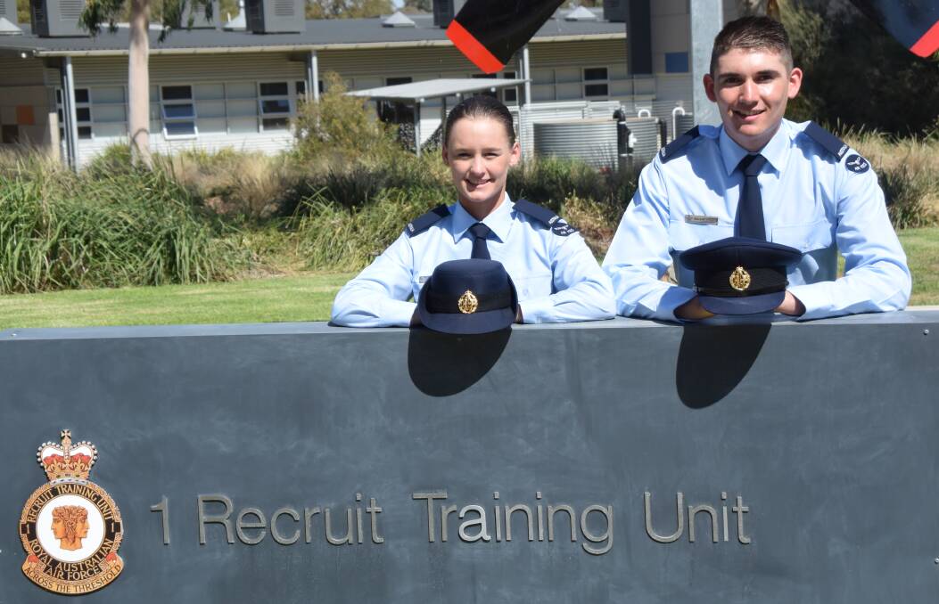 FIRST STEP: Aircraftswoman Kate Brown and Aircraftsman Benjamin Hayers were among 54 ADF Gap Year participants graduating from RAAF Base Wagga on Wednesday. Picture: Alex McConachie