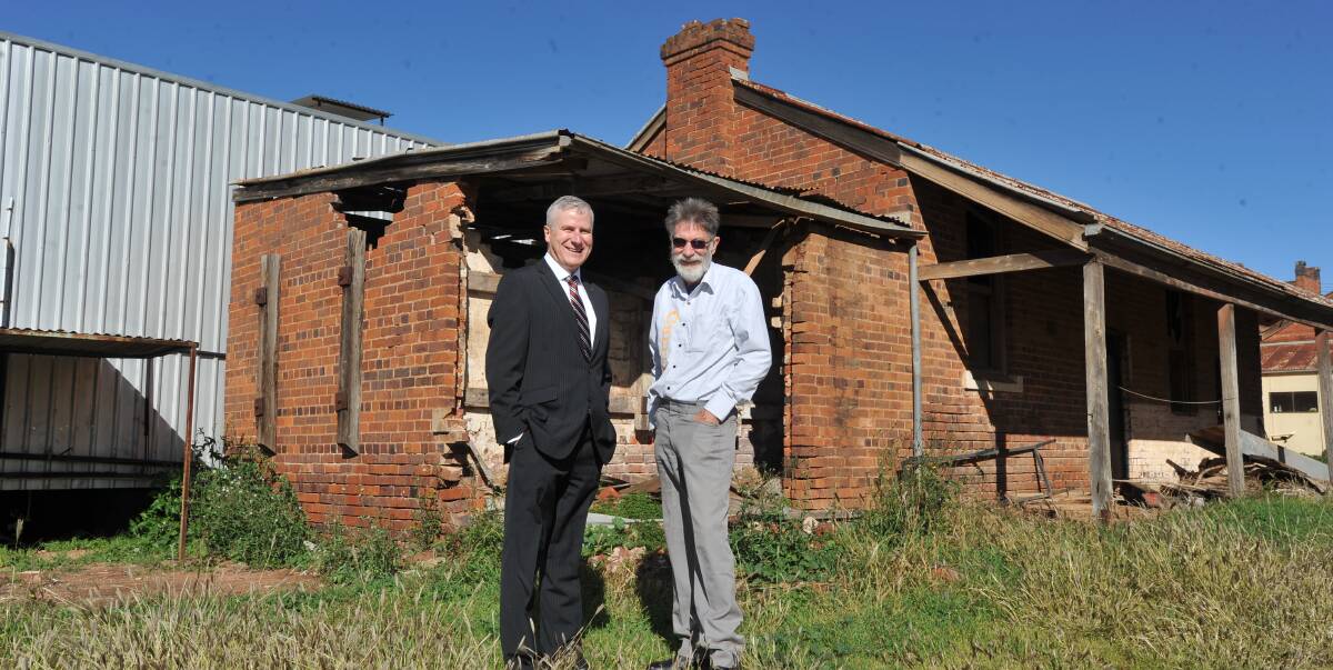 PROJECT: Member for Riverina Michael McCormack and Barry Lillywhite from the Coolamon Cheese Factory inspect the historic Coolamon Co-operative Building. Picture: Laura Hardwick
