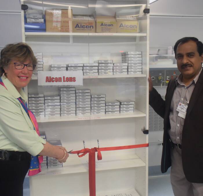 OPEN FOR BUSINESS: Incoming Rotary president Maryann Kelly and Wagga Base Hospital's director of clinical services Pankaj Banga unveil the new lens cupboard.