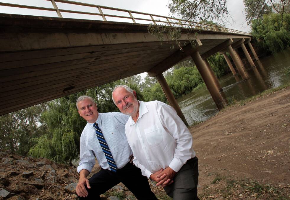 PLEDGE: Member for Riverina Michael McCormack and Wagga mayor Rod Kendall have both committed to funding a new Eunony Bridge crossing. Picture: Les Smith