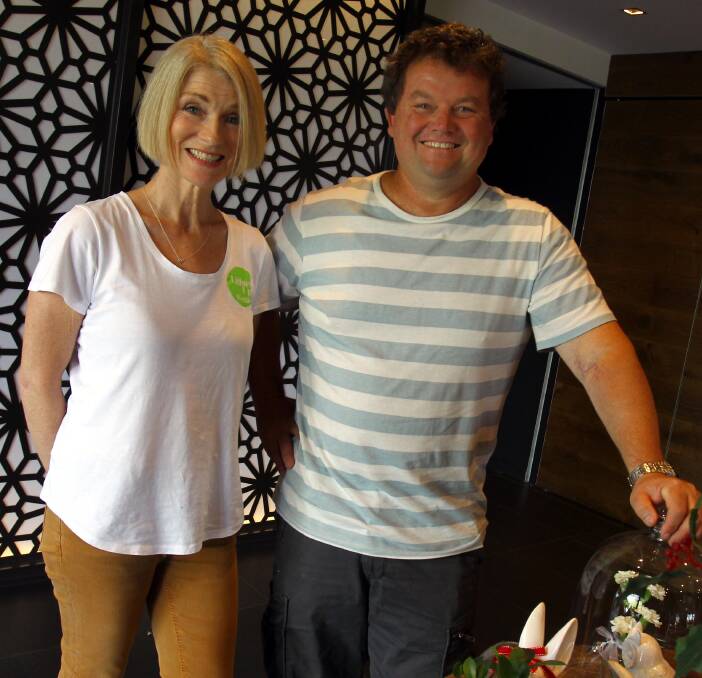 ACHIEVEMENT: Lighten Up Wagga founder Judy Davie congratulates challenge participant Wayne Manwaring on losing 18 kilograms during the 12-week program. Picture: Les Smith