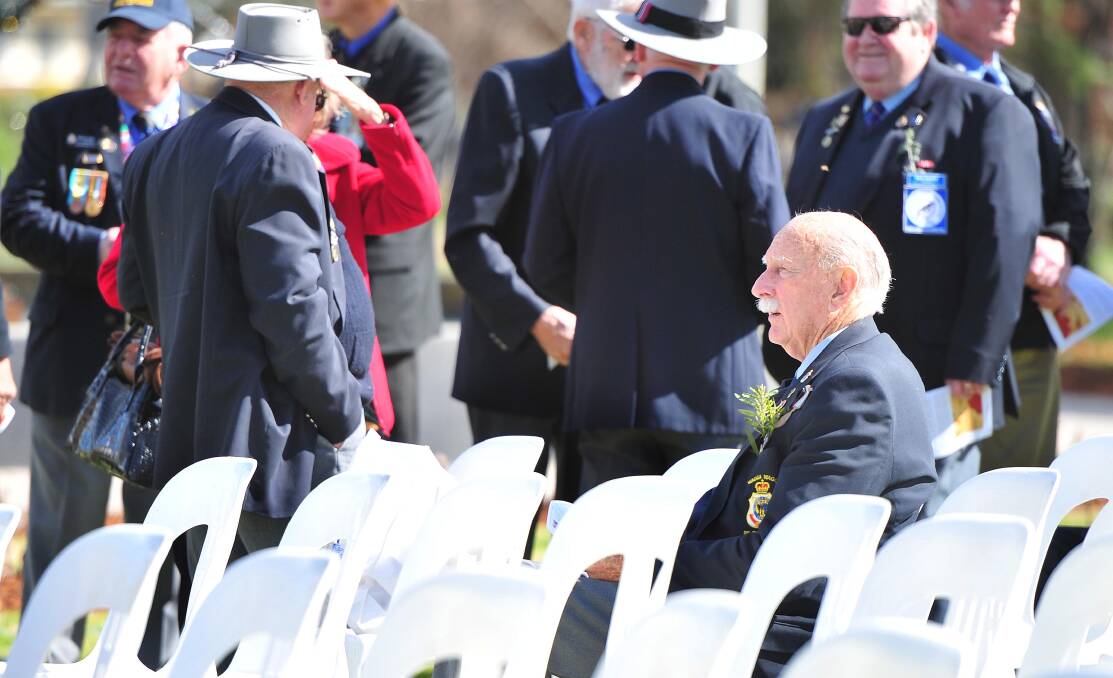 LEST WE FORGET: Wagga RSL sub-branch stalwart Bob Toose reflects on the Battle for Australia service at the Victory Memorial Gardens. Picture: Kieren L Tilly