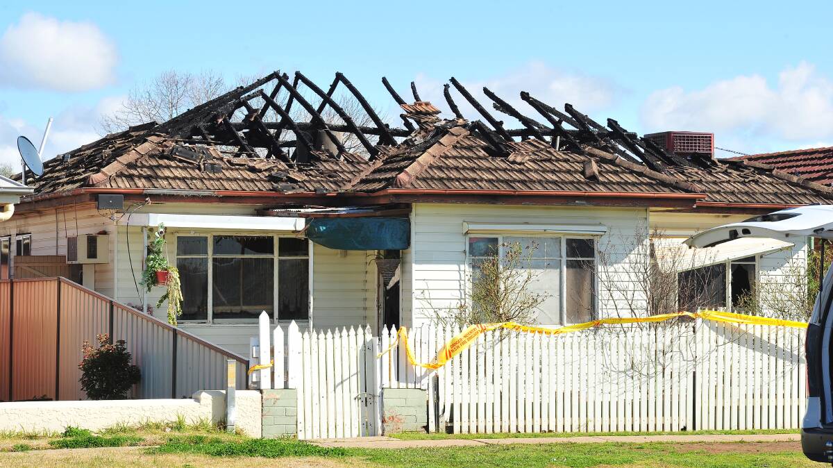 BURNT OUT: The charred remnants of a Slocum Street home that caught fire late on Thursday night. Picture: Kieren L Tilly