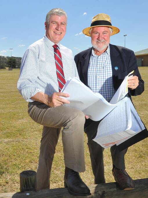LOCKED IN: Member for Riverina Michael McCormack and Wagga mayor Rod Kendall have welcomed a funding boost to build a $9 million indoor stadium at Equex.