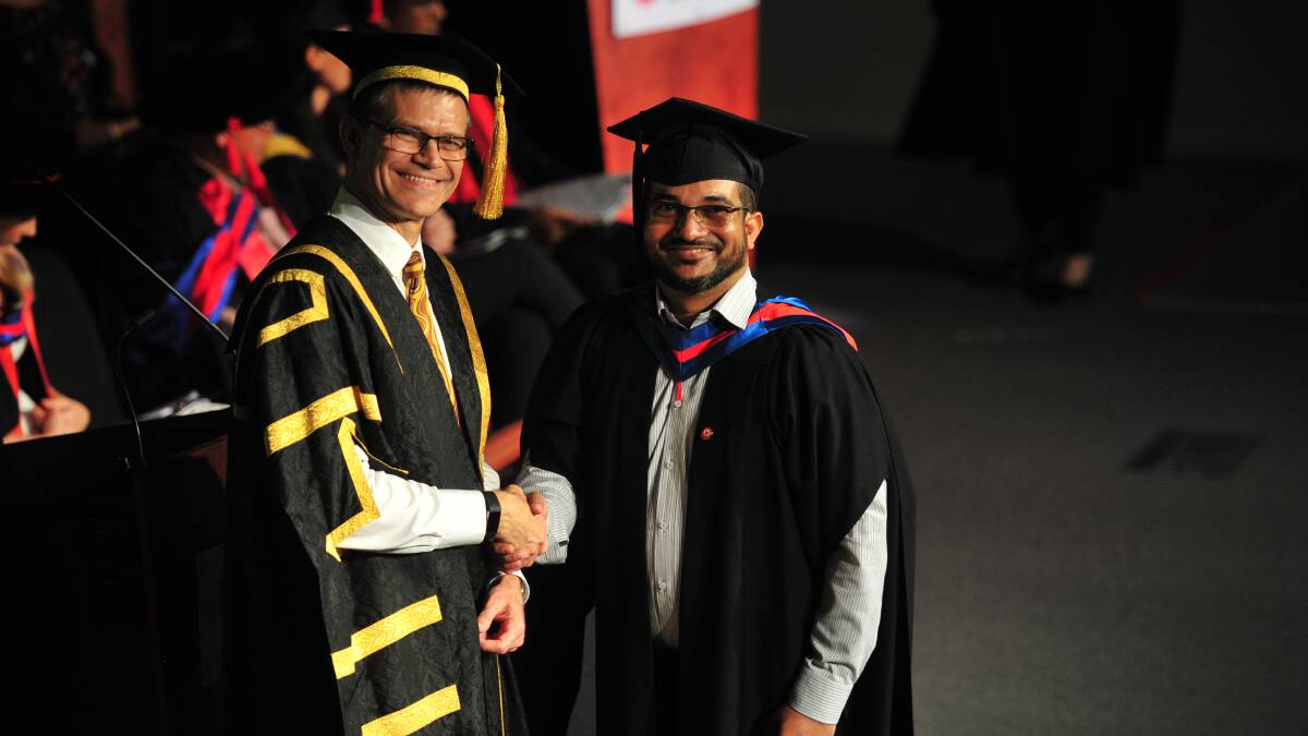 CROSSING THE STAGE: Saad Ullah Khan graduates with a Masters in Business Administration. Picture: Annie Lewis 