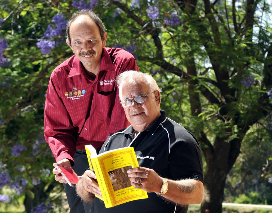 FLASHBACK TO 2014: CSU's Lloyd Dolan is with Dr Stan Grant, the author of the second New Wiradjuri Dictionary. Picture: Les Smith 