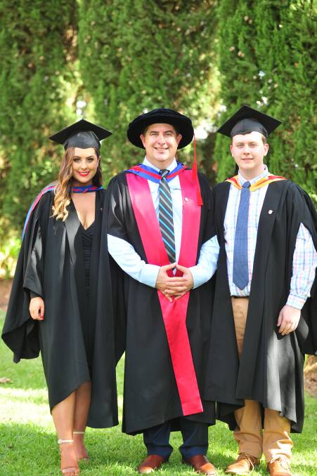FAMILY ACHIEVEMENTS: Sophie, Chris and Jack Blanchard at the CSU graduation ceremony on Monday evening. Picture: Annie Lewis 