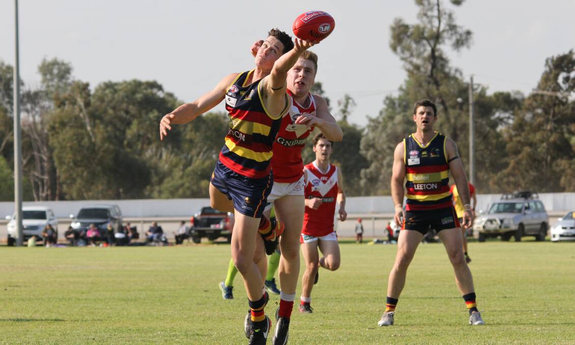 JUST OUT OF REACH: Crows' Luke Potter desperately tried to snare the ball, but it slipped just beyond his grasp in the match against CGP last Saturday. Photo: Ron Arel