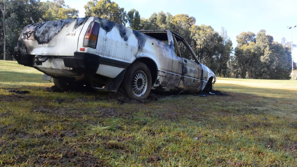 TRASHED: One of the burnt-out cars found at the Music Bowl last week. Picture: Shane Manning