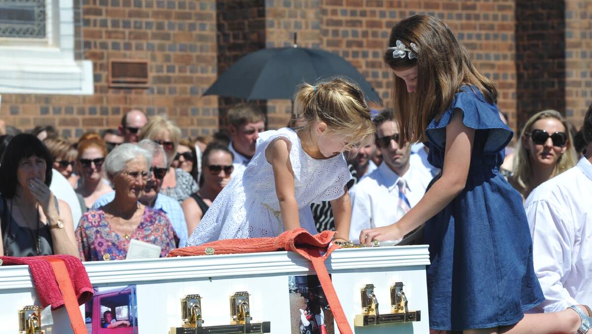 West Wyalong pauses in a moving ceremony to remember the life of nine-year-old Harry Worner. Pictures: Laura Hardwick
