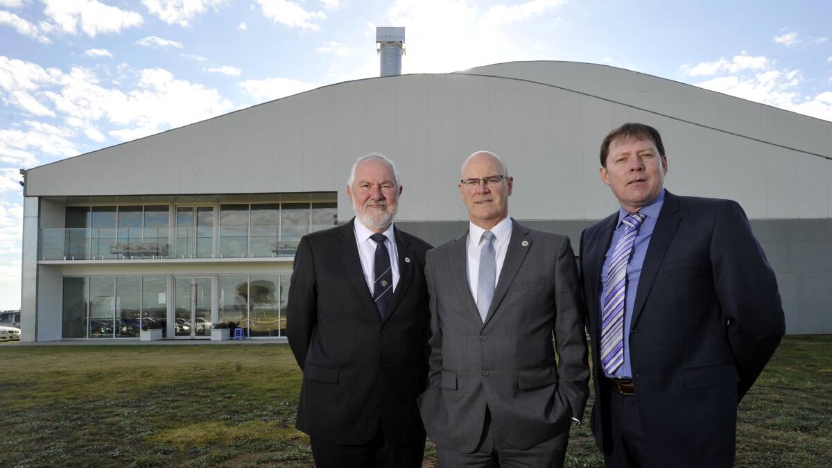 Wagga mayor Rod Kendall, Wagga City Council general manager Phil Pinyon and Rex's Dale Hall at the former Douglas Aerospace hangar. Picture: Les Smith